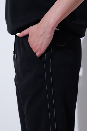 【25AW予約商品-25844000】サイドボールチェーンポンチドロストパンツ